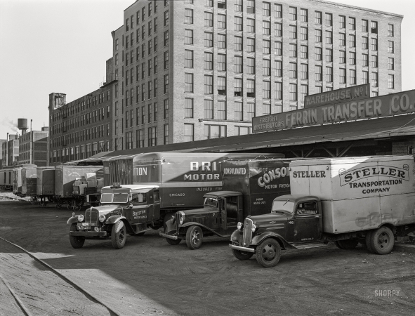 Photo showing: Terminal Warehouse -- September 1939. Trucks loading at terminal warehouse. Minneapolis, Minnesota.