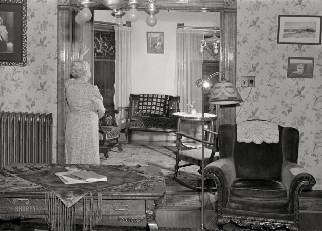 Photo showing: The Parlor Door -- April 1940. Home in Scranton, Iowa. Closing sliding door to little-used parlor.