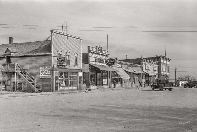 Photo showing: Michigan West -- October 1937. Main street in Michigan, North Dakota.