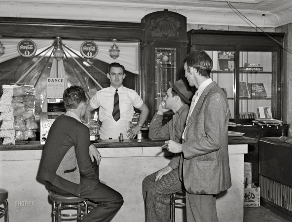 Photo showing: Sugar Bar -- November 1940. Boys in soft drink parlor. Central City, Kentucky.
