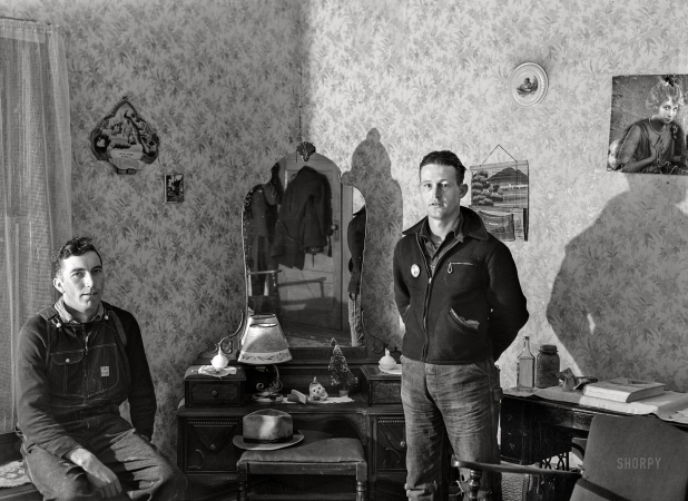 Photo showing: Threes Company. -- December 1940. Construction workers at Hercules powder
plant in their room in boardinghouse. Radford, Virginia.