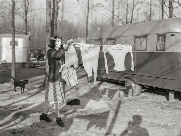 Photo showing: I Walk the Line -- March 1941. Sailor's wife living in trailer camp for construction workers near Navy yard. Portsmouth, Virginia.