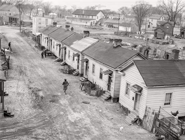 Photo showing: -- Street View -- -- March 1941. Housing in Norfolk, Virginia.