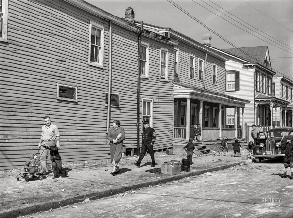Photo showing: Foot Traffic. -- March 1941. Portsmouth, Virginia. Houses near Navy yard.