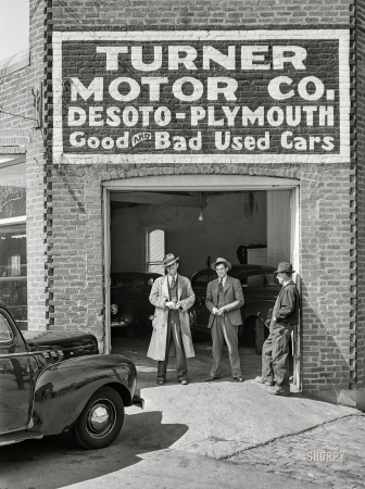 Photo showing: Good and Bad -- March 1941. Bedford, Virginia. Used car salesmen.
