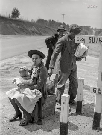 Photo showing: Mamas Family. -- March 1941. Negro family waiting for ride into town. Halifax County, Virginia.