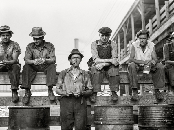 Photo showing: The Lunch Crowd -- July 1941. Stockyard workers during lunch hour. Chicago, Illinois.