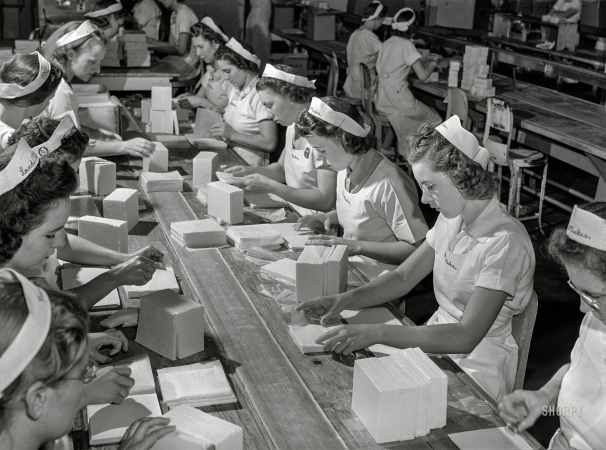 Photo showing: The Dairy Maids -- July 1941. Packing butter cut into squares for use in restaurants. Land O'Lakes plant, Minneapolis.
