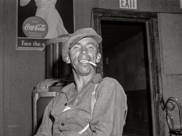 Photo showing: Crushing It -- August 1941. Farm worker in beer parlor on a Sunday afternoon. Bruce Crossing, Michigan.