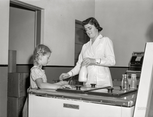 Photo showing: Milk and Honeys -- August 1941. Child buying bottle of milk. Duluth Milk Company. Duluth, Minnesota.