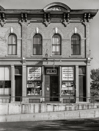 Photo showing: Family Pharm -- August 1941. Drug store. Carpentersville, Illinois.