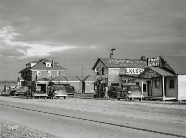 Photo showing: Jims Place -- February 1942. Union County, Illinois. Gas station and roadhouse.