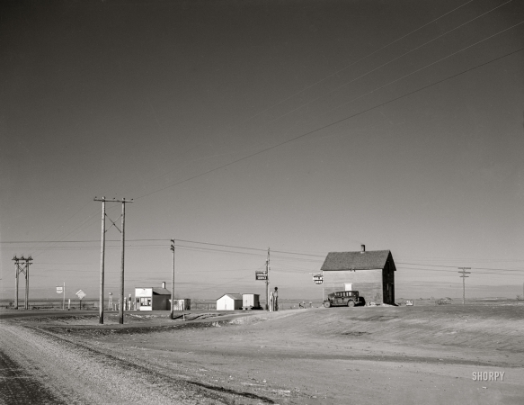 Photo showing: Next Beer 50 Miles -- February 1942. Faulk County, South Dakota. Crossroads.