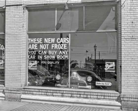 Photo showing: Hot Wheels - -- May 1942. Grand Island, Nebraska. Auto dealer's window.