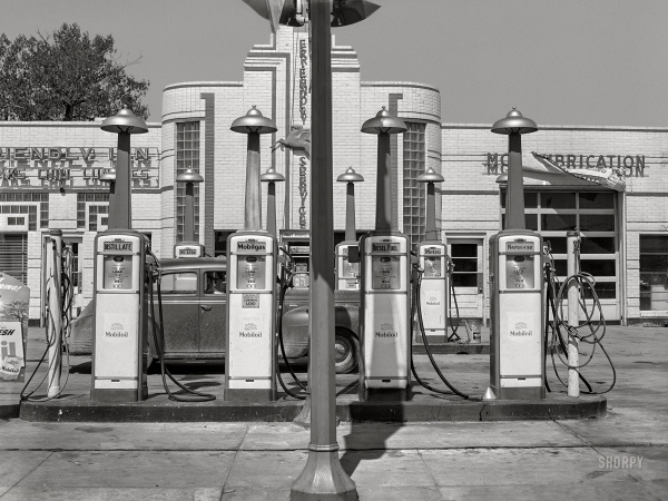 Photo showing: Friendly Service -- May 1942. North Platte, Nebraska. Gas station.