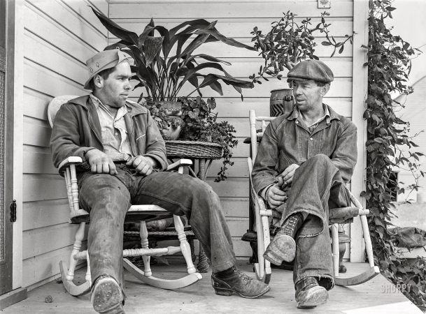 Photo showing: Planters Porch -- September 1941. Farmer and son, members of the Boundary Farms FSA project. Boundary County, Idaho.
