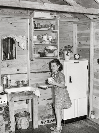 Photo showing: Knotty Kitchen -- September 1941. Hermiston, Oregon. Worker housing at the Umatilla
ordnance depot discloses its temporary nature by the unfinished interior.
