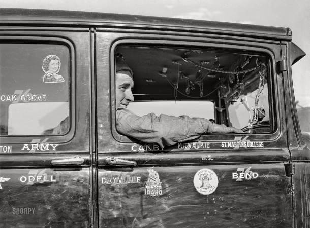 Photo showing: Customized -- November 1941. Migrant agricultural worker in his automobile. Wilder, Idaho.
