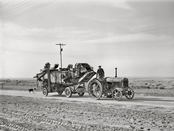 Photo showing: Thresher Parade -- December 1941. Threshing machine. Canyon County, Idaho.