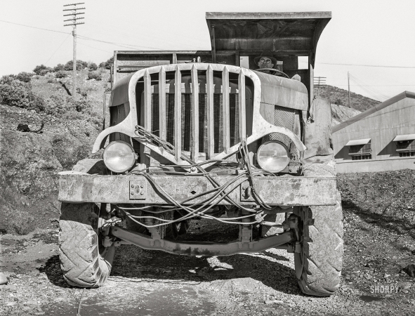 Photo showing: Big Dam Truck -- December 1941. Dump truck which carries materials for use in construction of Shasta Dam.