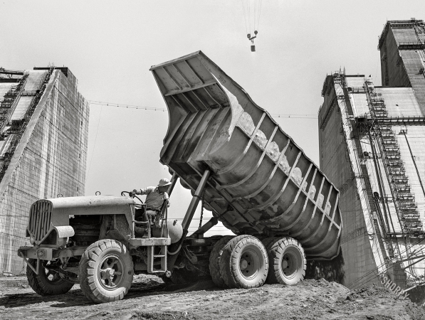Photo showing: Dumped! -- June 1942. Shasta County, California. Butane-powered dump truck used in the construction of Shasta Dam.