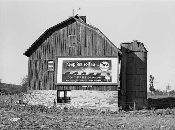 Photo showing: War Barn -- October 1941. Defense motive in outdoor advertising. Near Elmira, New York.