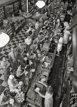 Photo showing: Fountain Service - -- July 1942. Washington, D.C. People's drugstore on G Street N.W. at noon.