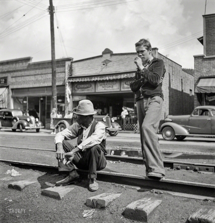 Photo showing: My Little Town -- September 1938.  'Sittin' around' mining town of Osage, West Virginia.