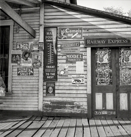 Photo showing: Sweet Snuff -- September 1938. Express Agency office and general store in coal mining town of Scotts Run, West Virginia.