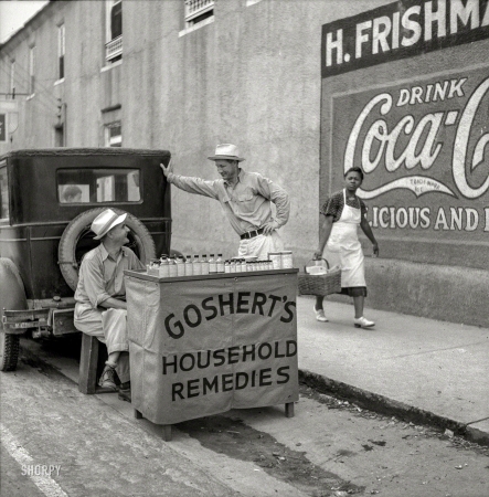 Photo showing: Pharmacy Alfresco -- August 1940. Street scenes in Port Gibson, Mississippi -- Goshert's Household Remedies.