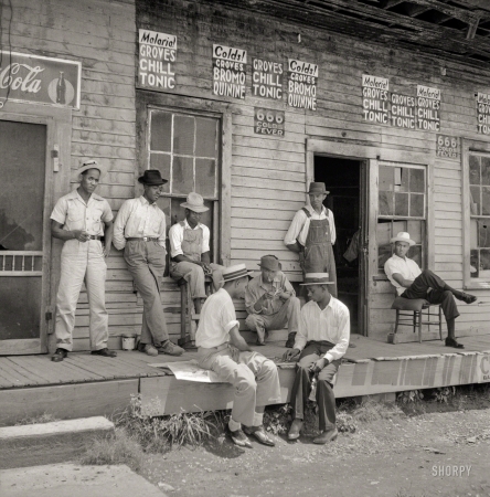 Photo showing: Chill Tonic -- August 1940. Port Gibson, Mississippi. Habitues of the Dreamboat Inn.