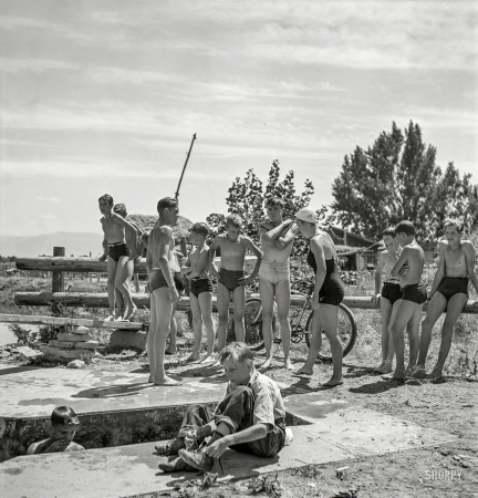 Photo showing: Swimmers of 42 -- July 1942. Rupert, Idaho. Dressing after swimming.
