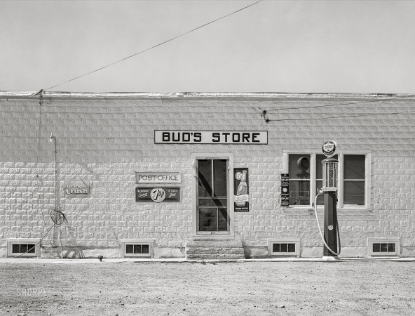 Photo showing: Buds Store -- August 1941. Store on main street of town. Lone Tree, North Dakota.