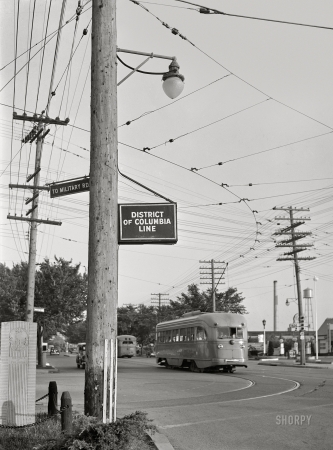 Photo showing: The District Line -- June-July 1942. District of Columbia and Maryland boundary line at Wisconsin Avenue.