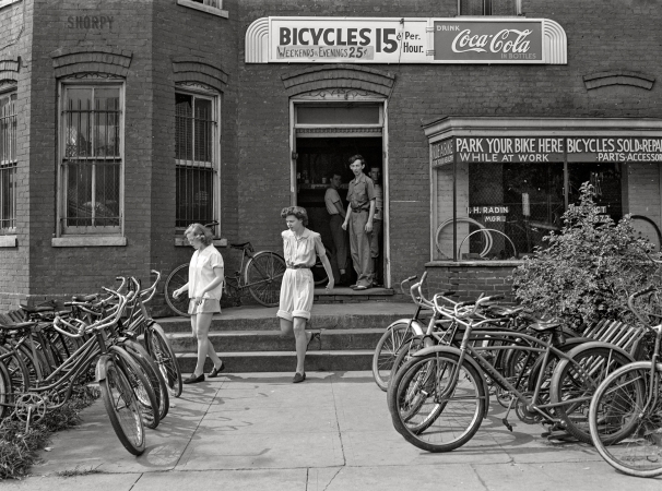 Photo showing: Pedal-Pushers -- June 1942. Washington, D.C. Bicycle rental shop on 22nd Street, near Virginia Avenue N.W., on Sunday.