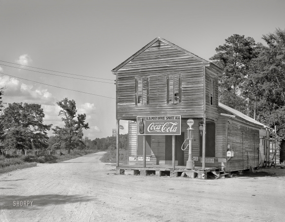 Photo showing: Crossroads Store -- August 1936. Crossroads store and post office. Sprott, Alabama.