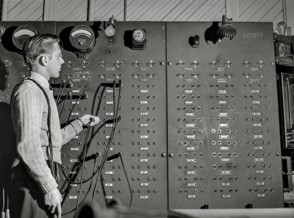 Photo showing: The Right Connections -- May 1942. Jim Tillma in the electrical engineering laboratory. University of Nebraska, Lincoln.