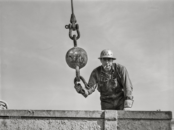 Photo showing: You Lookin at Me? -- June 1942. Rigger on the Fort Loudoun Dam, a Tennessee Valley Authority project.