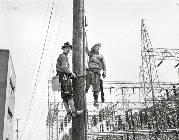 Photo showing: TVA Linemen -- June 1942. Watts Bar Dam, Tennessee. Tennessee Valley Authority linemen.
