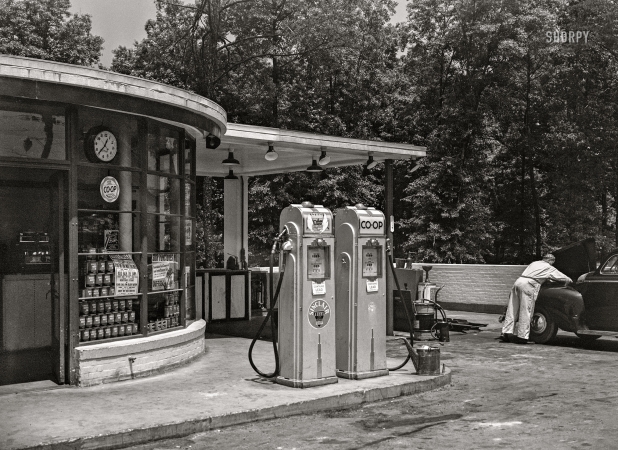 Photo showing: CO-OP GAS. -- May 1942. Cooperative gas station at Greenbelt, Maryland, a model community.