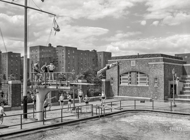 Photo showing: Red Hook Pool -- June 1942. Brooklyn, New York. Red Hook housing development. Diving pool at the play center
which is supervised by the Department of Parks. Charge is 9 cents for children, 25 cents for adults.