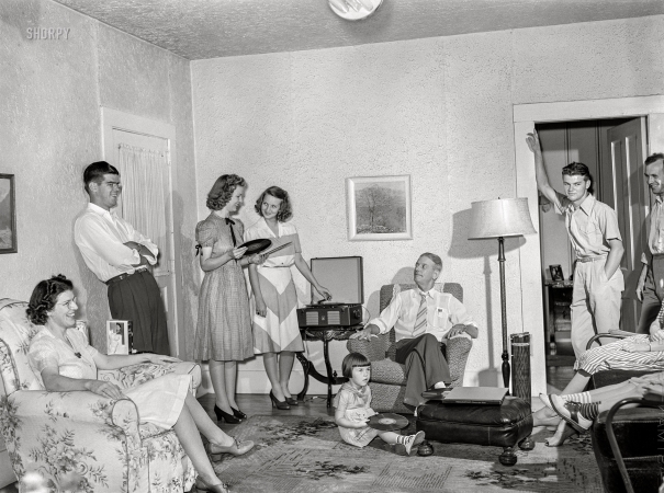 Photo showing: Record Time - -- July 1942. Hayti, Missouri. Family of Glen Eaker, superintendent
of the local Rural Electrification Administration cooperative.