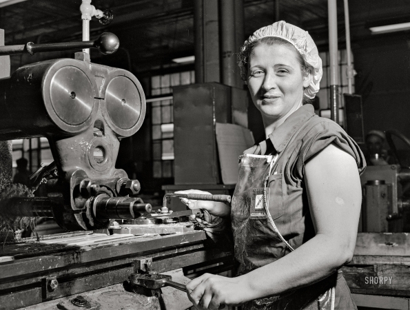 Photo showing: Miller Time -- September 1942. Detroit, Michigan. Milling machine operator at the Allison Motors plant.