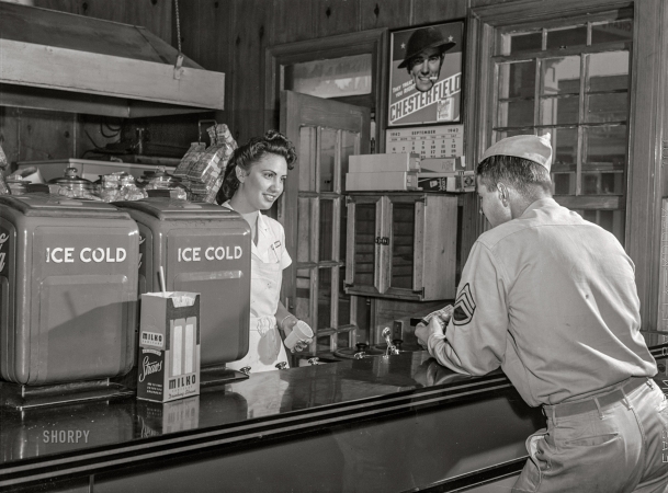 Photo showing: Soft Serve -- September 1942. Fort Belvoir, Virginia. Sergeant George Camplair on one of his many visits to the post exchange.