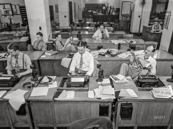 Photo showing: Get Me Rewrite! -- September 3, 1942. New York. Newsroom of the New York Times newspaper. Reporters and rewrite men.