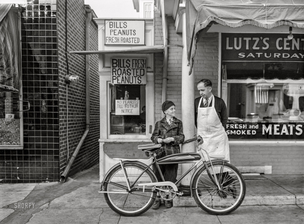 Photo showing: No Peanuts -- November 1942. Lititz, Pennsylvania. Peanut stand next to the Lutz butcher shop ... 