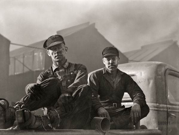 Photo showing: Dark Matter -- November 1942. Sunray, Texas. Workers at a carbon black plant.