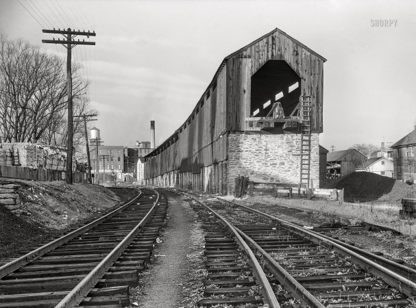 Photo showing: Lititz, Pa. -- November 1942. Lititz, Pennsylvania. Tracks of the Lancaster-Reading Railroad. In the distance is the local chocolate factory.