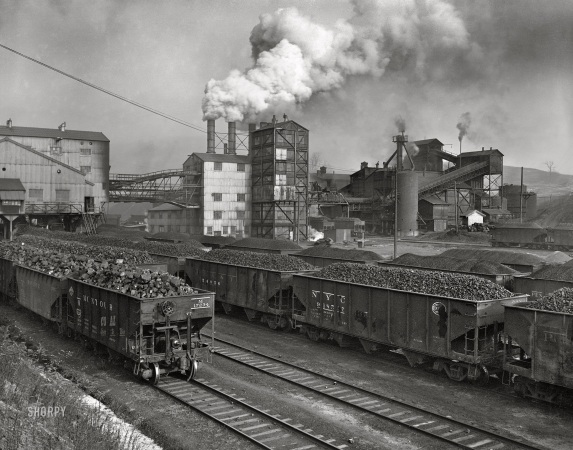 Photo showing: Rolling Coal -- November 1942. Pittsburgh, Pennsylvania. Champion No. 1 cleaning plant. Coal cars ready for market.