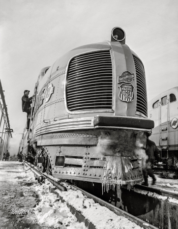 Photo showing: Hybrid EV -- December 1942. Chicago, Illinois. One of the Chicago and North Western streamliner diesel electric locomotives.